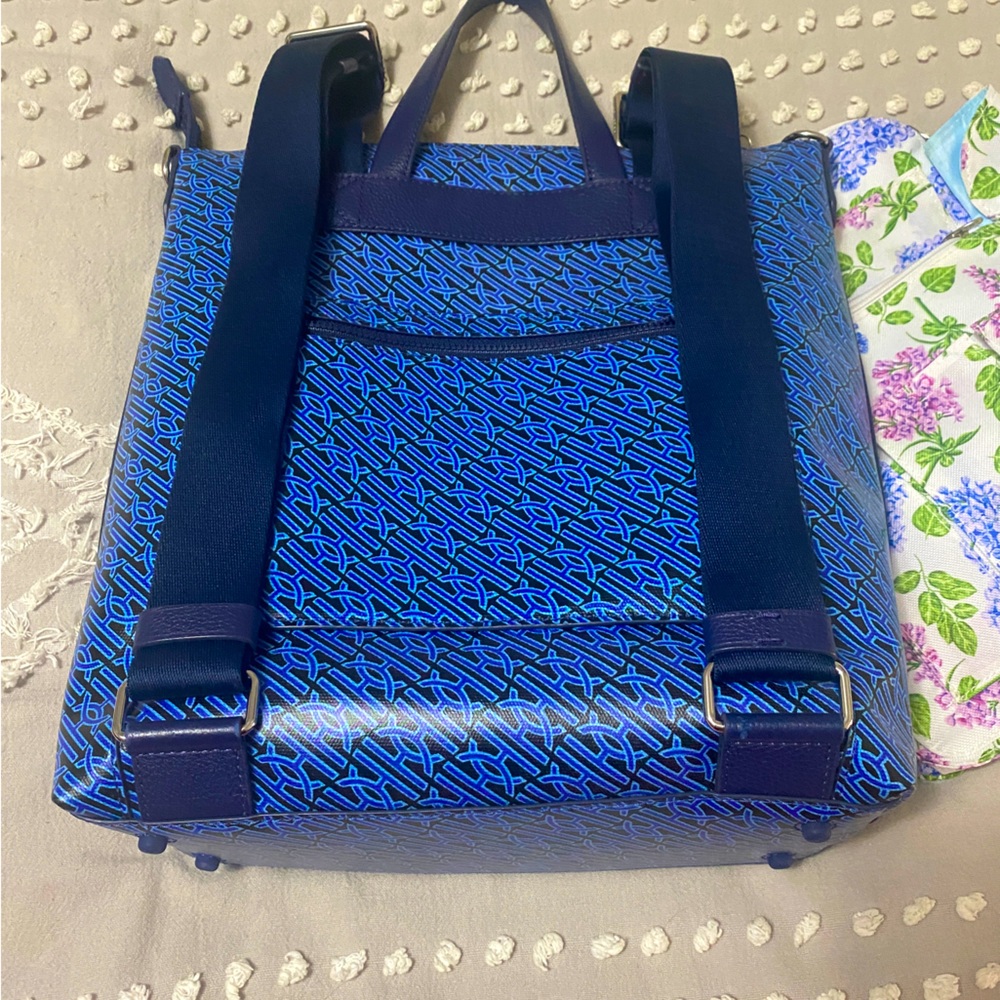 Cole Haan covered leather backpack/crossbody. Like new. Only used a few times.